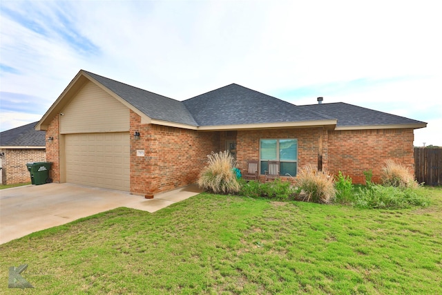 single story home featuring brick siding, a shingled roof, concrete driveway, an attached garage, and a front yard