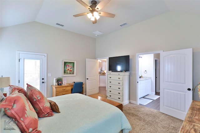 bedroom featuring carpet floors, connected bathroom, visible vents, and a ceiling fan