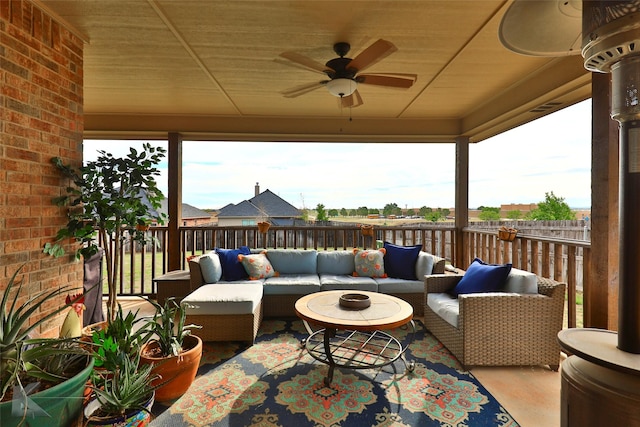 exterior space featuring plenty of natural light and a ceiling fan