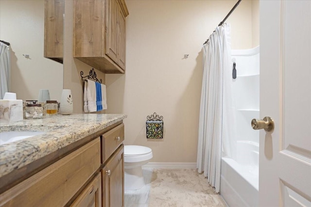 full bath with toilet, shower / bath combo, baseboards, and vanity