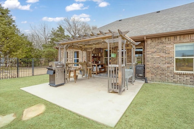 view of patio featuring area for grilling, fence, and a pergola