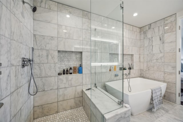 full bathroom featuring a freestanding tub, tile walls, tiled shower, and recessed lighting