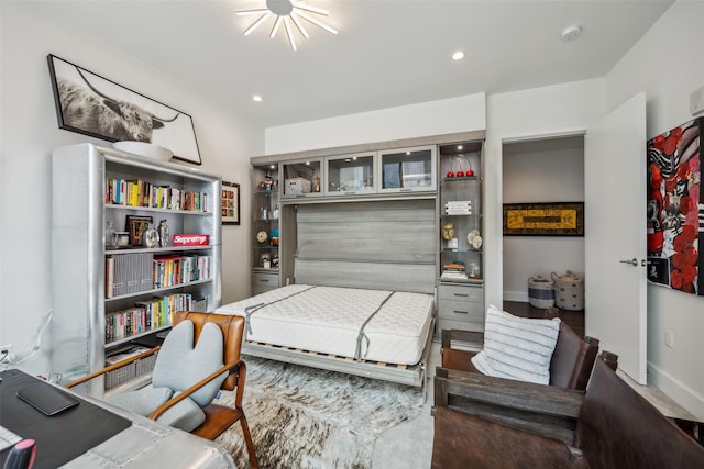 bedroom with recessed lighting and baseboards