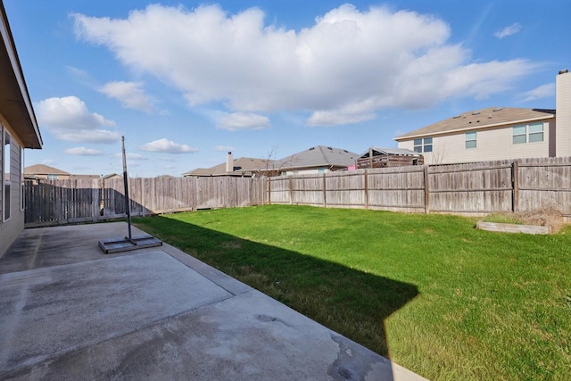 view of yard with a patio and a fenced backyard