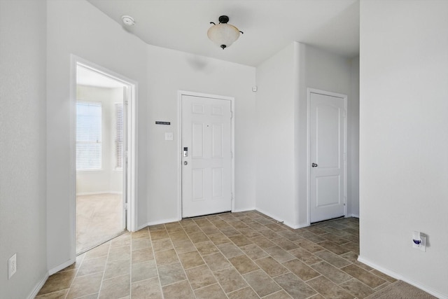 foyer with baseboards