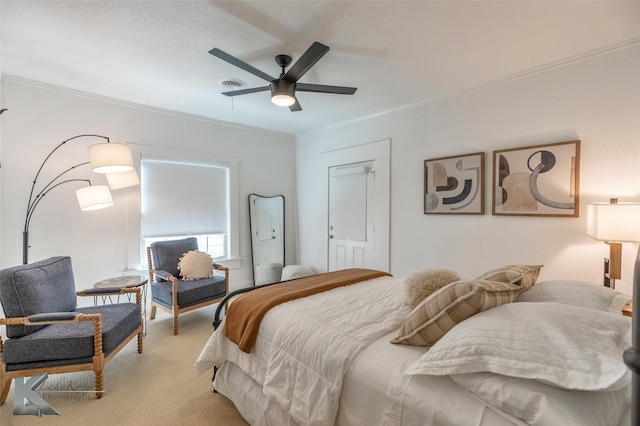 bedroom with a ceiling fan, light carpet, and visible vents