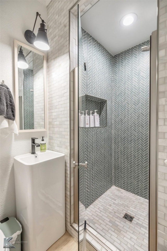 full bathroom featuring a shower stall