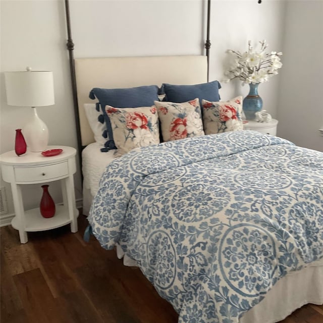 bedroom featuring wood finished floors