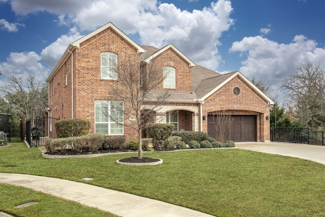 traditional-style house featuring concrete driveway, brick siding, fence, and an attached garage