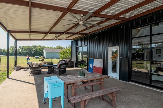 view of patio / terrace featuring ceiling fan and outdoor dining area