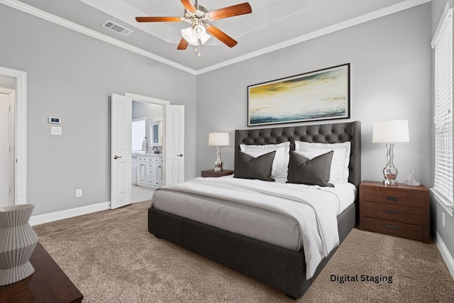 carpeted bedroom featuring ensuite bath, baseboards, visible vents, and ornamental molding