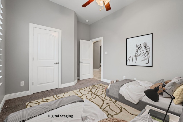 bedroom with light carpet, ceiling fan, lofted ceiling, and baseboards