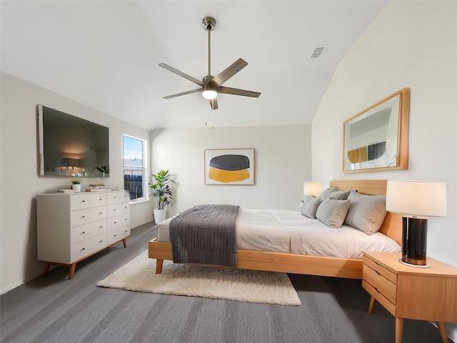 carpeted bedroom featuring vaulted ceiling, ceiling fan, and visible vents