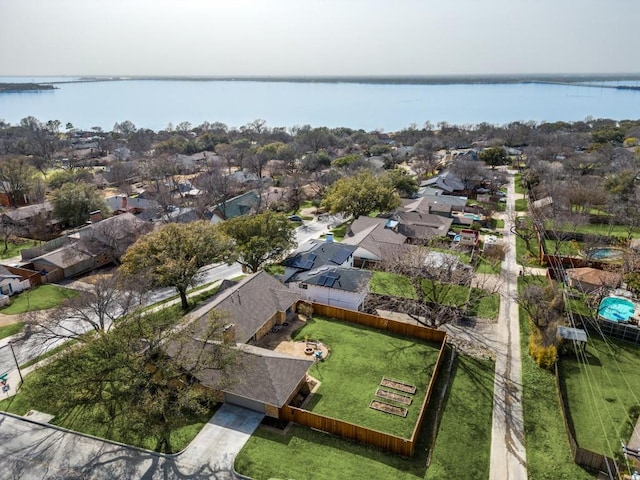 aerial view featuring a residential view and a water view