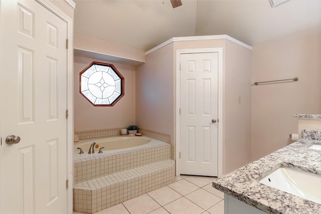 full bathroom with tile patterned floors, double vanity, a sink, and a bath