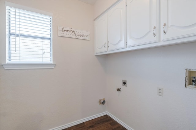 clothes washing area with cabinet space, baseboards, dark wood finished floors, washer hookup, and electric dryer hookup