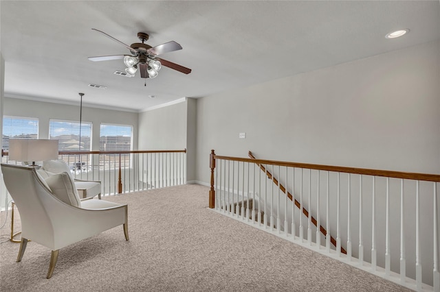 unfurnished room featuring ornamental molding, carpet flooring, visible vents, and recessed lighting