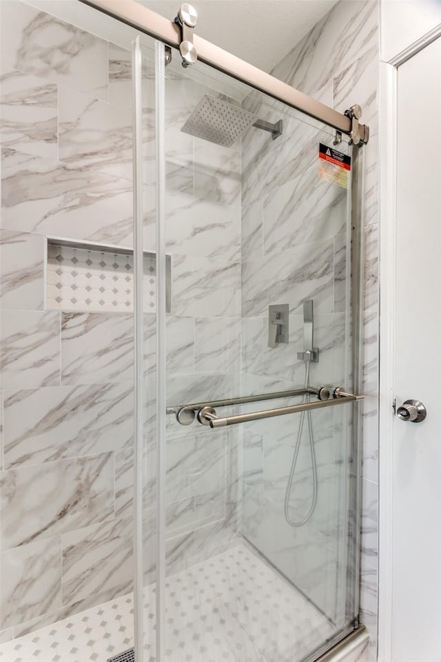 full bathroom with a stall shower