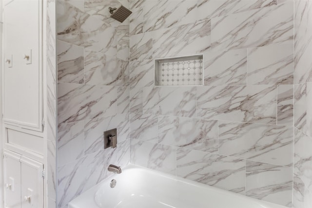 bathroom featuring bathing tub / shower combination