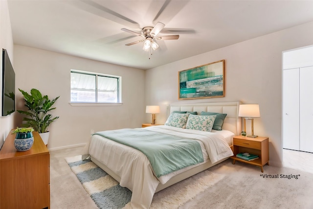 bedroom featuring a ceiling fan and carpet flooring