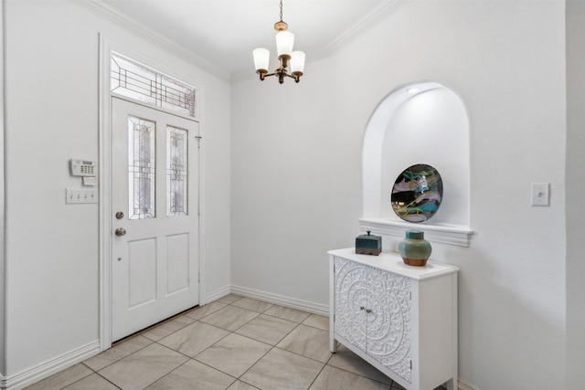 entryway with baseboards, ornamental molding, a notable chandelier, and light tile patterned flooring