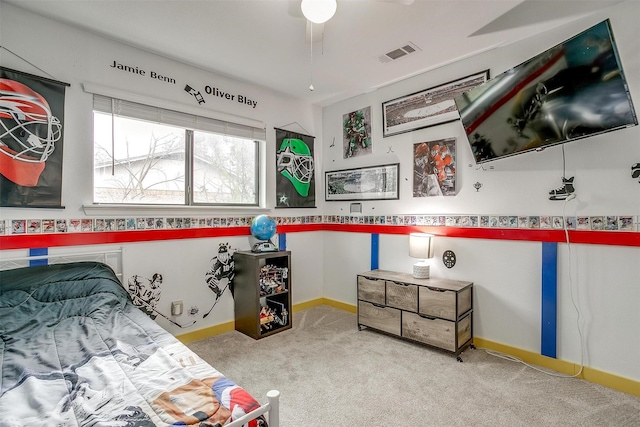 bedroom with carpet, visible vents, and baseboards