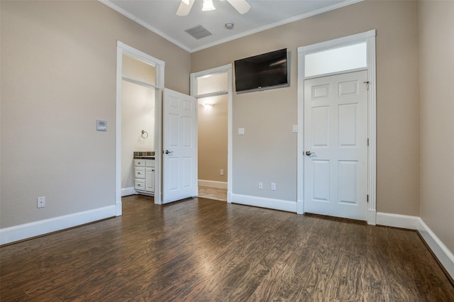 unfurnished bedroom with baseboards, ornamental molding, and dark wood-style flooring