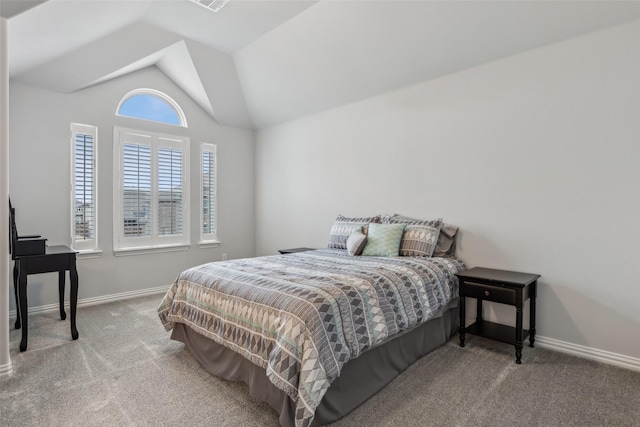 bedroom with carpet floors, lofted ceiling, visible vents, and baseboards