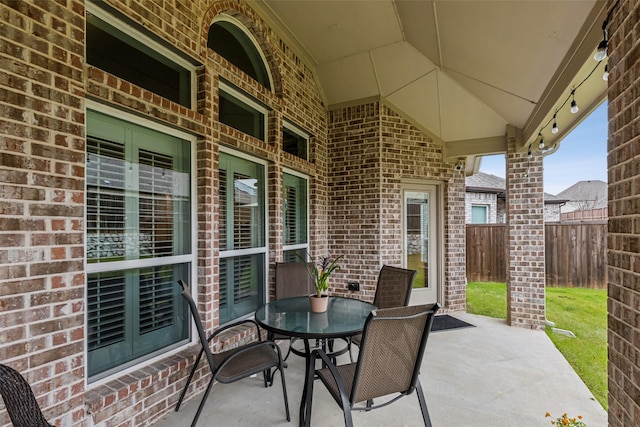 view of patio with fence