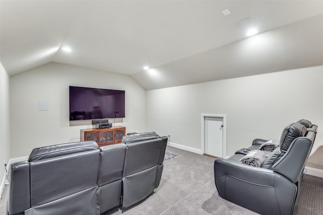 cinema featuring recessed lighting, light carpet, vaulted ceiling, and baseboards