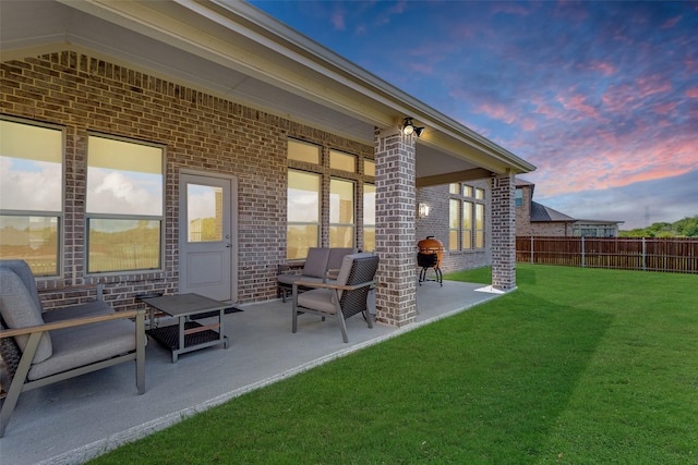 view of patio / terrace featuring fence