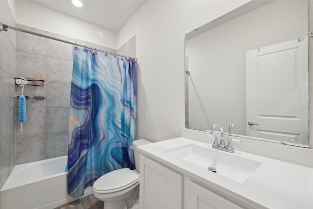 bathroom with toilet, shower / bath combo, and vanity