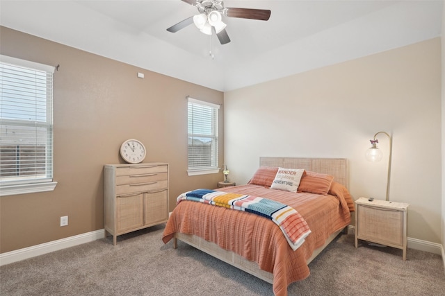 bedroom with a ceiling fan, carpet, and baseboards