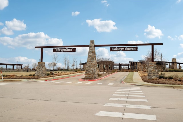 view of road with curbs and sidewalks