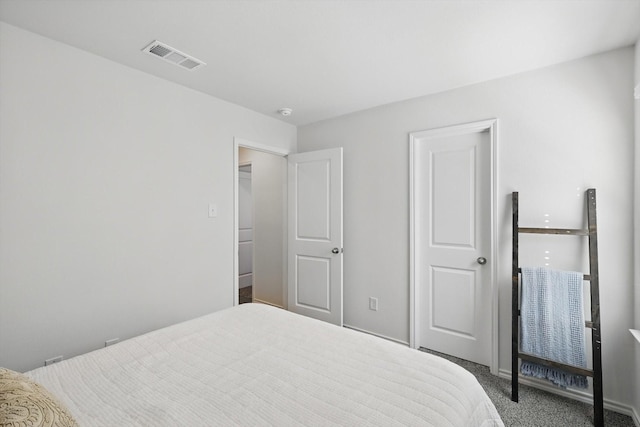 bedroom with carpet flooring and visible vents