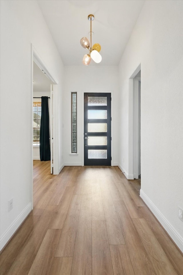 2821 Rosewood Way, Northlake, TX 76226 - foyer entrance featuring a chandelier and wood finished floors