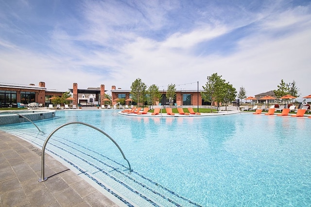 pool with a patio area