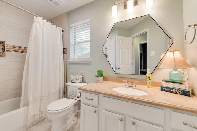 full bath with visible vents, shower / tub combo, vanity, and toilet