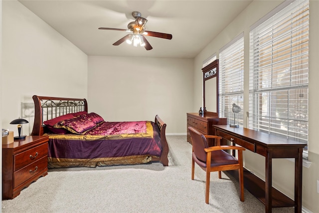 bedroom featuring carpet flooring, ceiling fan, and baseboards