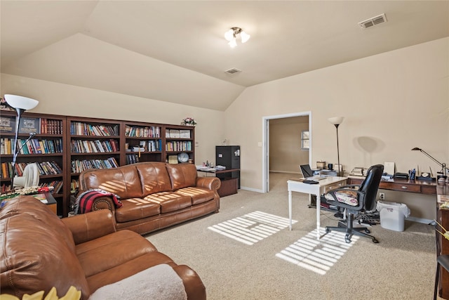 home office with baseboards, visible vents, vaulted ceiling, and carpet flooring