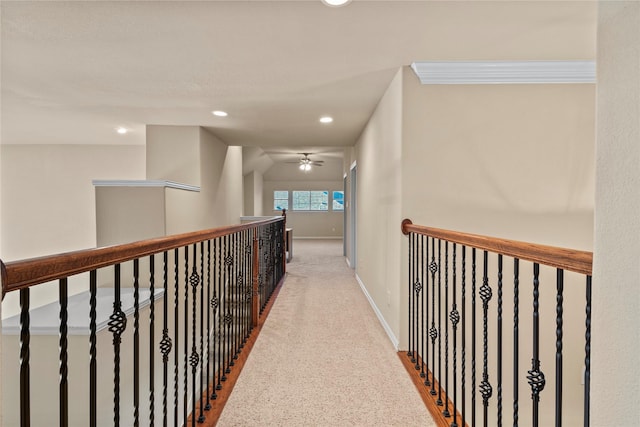 corridor featuring carpet floors, recessed lighting, and baseboards