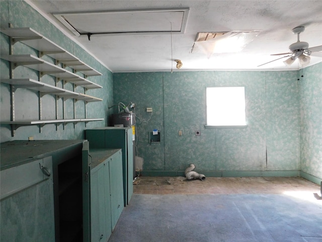 interior space with attic access and ceiling fan