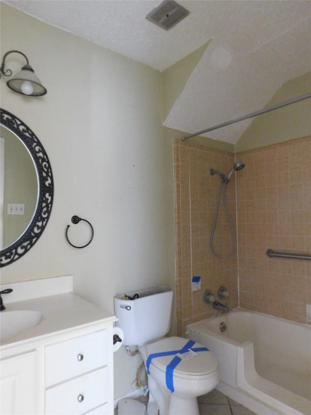 full bath with shower / bathing tub combination, toilet, a textured ceiling, vanity, and tile patterned floors