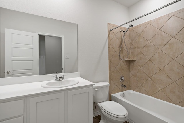 bathroom with toilet, shower / bathtub combination, and vanity