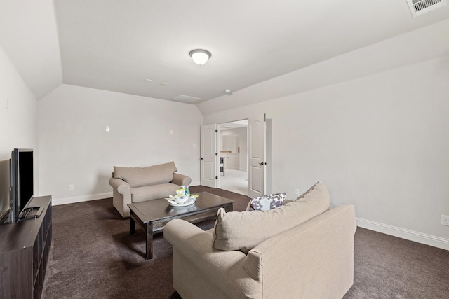 living area featuring dark colored carpet, visible vents, lofted ceiling, and baseboards