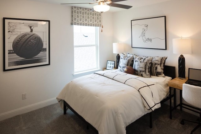 carpeted bedroom featuring ceiling fan and baseboards