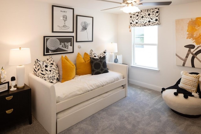 bedroom with ceiling fan, carpet floors, and baseboards