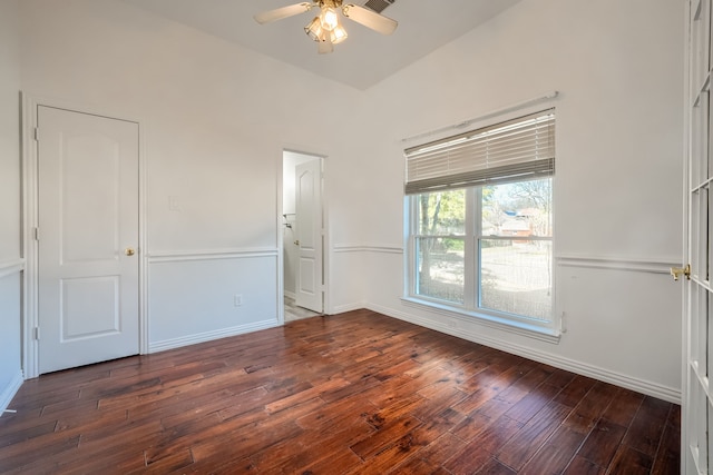 unfurnished bedroom with wood-type flooring, visible vents, ceiling fan, and baseboards