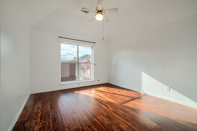 empty room featuring ceiling fan, hardwood / wood-style floors, and baseboards