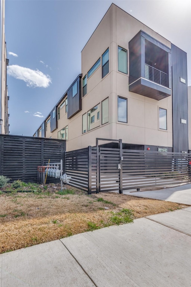 view of property featuring fence